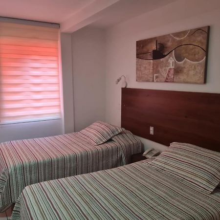 Hotel Plaza Colon Arica Bagian luar foto