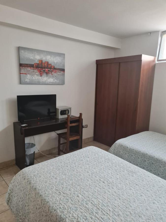 Hotel Plaza Colon Arica Bagian luar foto